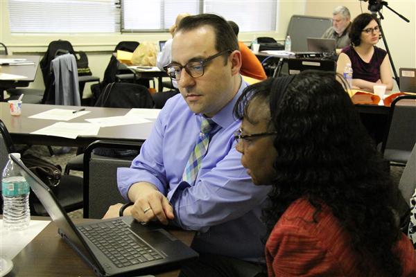 School staff working on the Equity Sims. School staff working on the Equity Sims.
