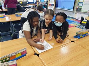Students working together in math