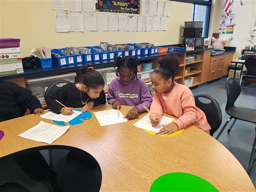 Students working together in math