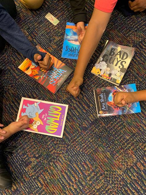 Students loving books.