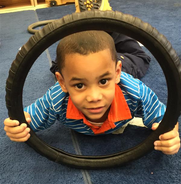 Child performing gross motor 