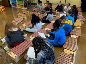 students working with xylophones 